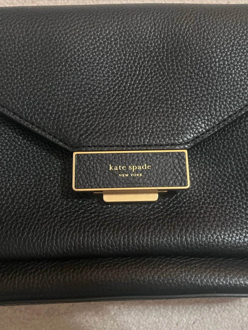 kate spade Black Pebbled Leather Envelope purse with Gold Plaque Accent